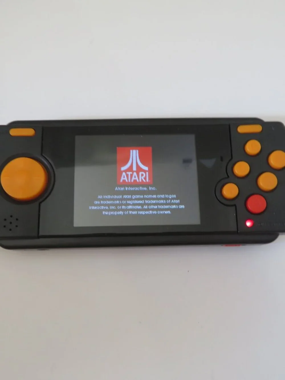 Atari Flashback Portable Deluxe Edition with 70 Games Handheld No Manual Charged